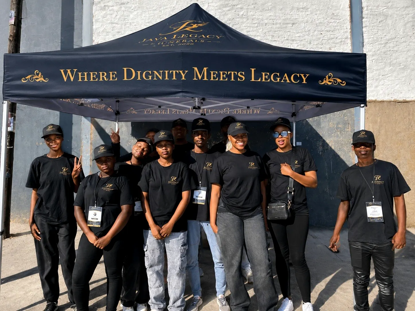 The Java Legacy team under the branded gazebo, Where Dignity Meets Legacy